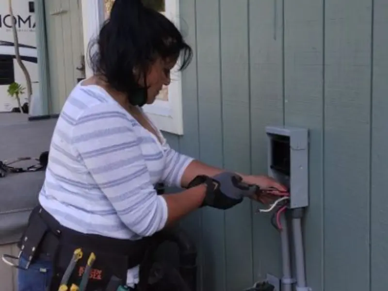 Licensed electrician wiring an exterior subpanel in Salmon Creek