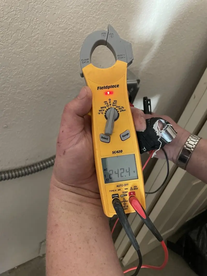 Voltage testing with clamp meter during Electrical Installation Services in Salmon Creek